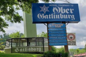 ober gatlinburg sign with tram in the background